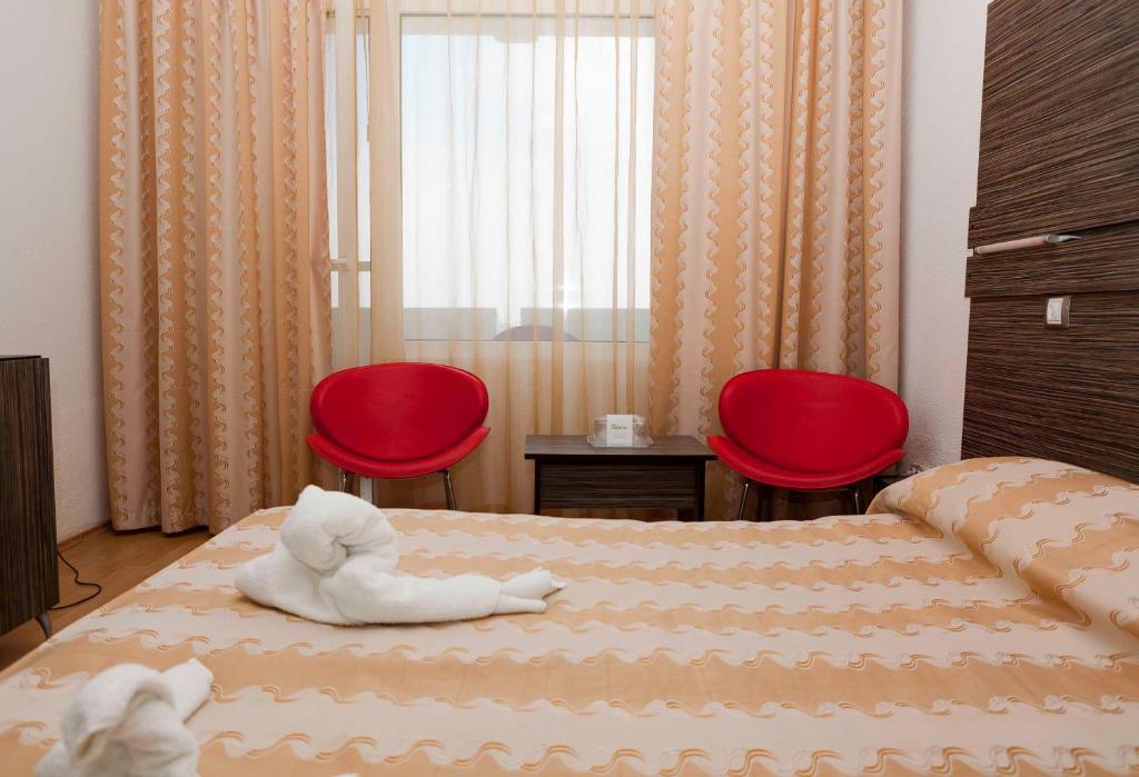 Hotel Capitol Jupiter Pokoj fotografie